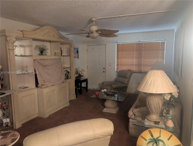 175 NE 203rd Ter Unit 24, Miami Gardens, FL 33179 - carpeted living area featuring a textured ceiling and a ceiling fan