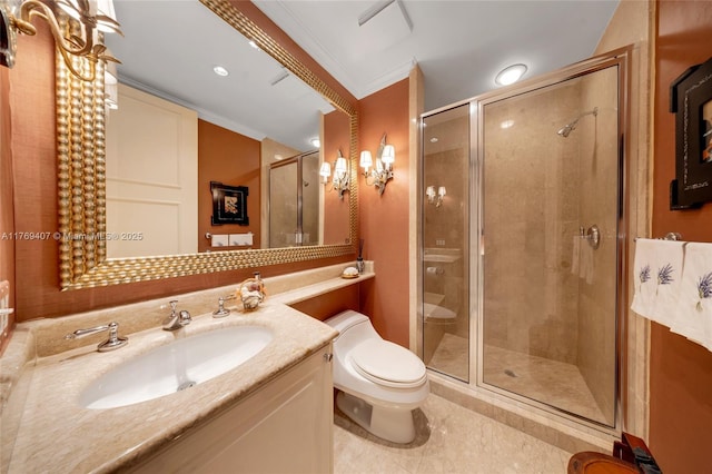 bathroom featuring tile patterned flooring, a shower stall, vanity, toilet, and ornamental molding