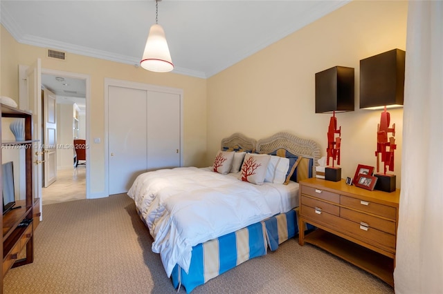bedroom with light colored carpet, ornamental molding, visible vents, and a closet
