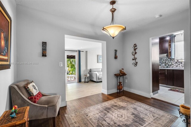 1500 SW 18th St, Miami, FL 33145 - sitting room with dark wood-style flooring and baseboards