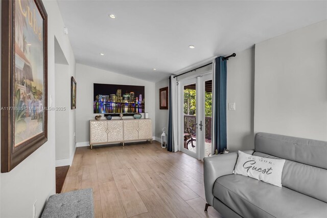 1500 SW 18th St, Miami, FL 33145 - living area with vaulted ceiling, recessed lighting, baseboards, and light wood-style floors
