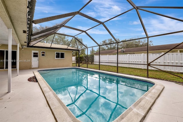 view of pool with a fenced in pool, a patio, a lanai, and fence