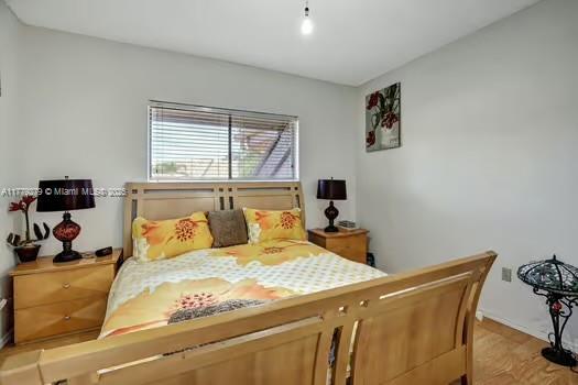 bedroom featuring light wood-type flooring