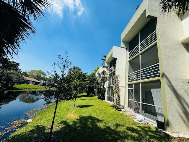 view of yard with a water view