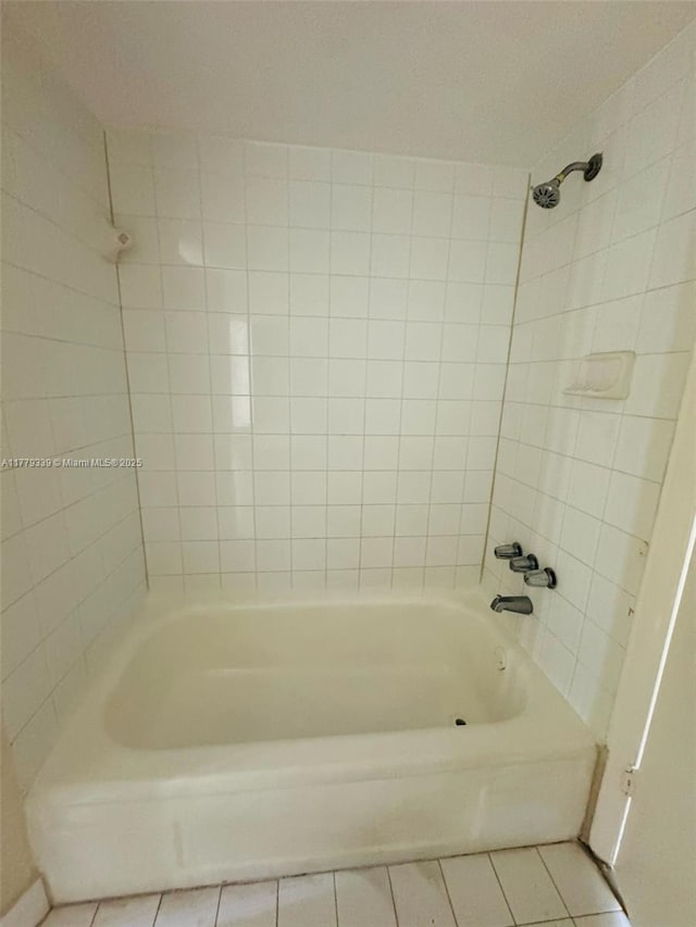 full bathroom with bathing tub / shower combination and tile patterned flooring