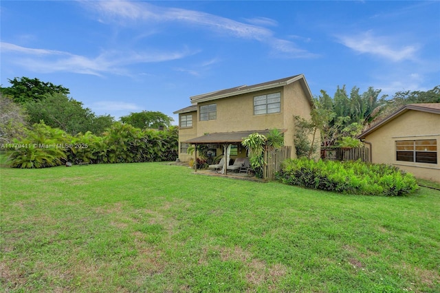 11724 SW 134th Ct, Miami, FL 33186 - rear view of house featuring a yard and stucco siding