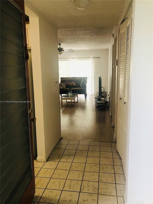 3776 Inverrary Blvd Unit 205R, Lauderhill, FL 33319 - corridor featuring a textured ceiling