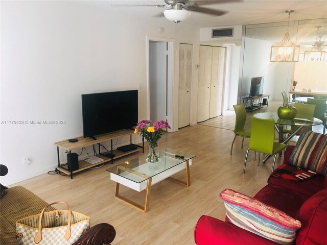 3776 Inverrary Blvd Unit 205R, Lauderhill, FL 33319 - living area with a ceiling fan and wood finished floors