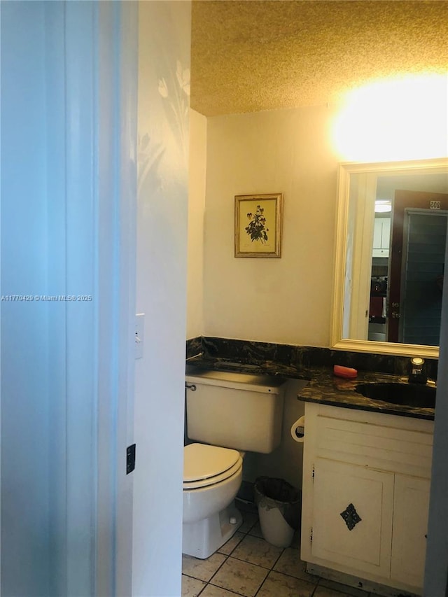 3776 Inverrary Blvd Unit 205R, Lauderhill, FL 33319 - bathroom featuring toilet, vanity, and tile patterned floors