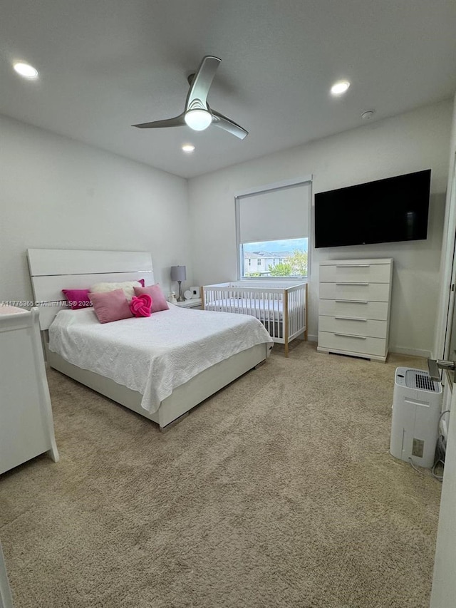 bedroom with recessed lighting, baseboards, a ceiling fan, and carpet floors