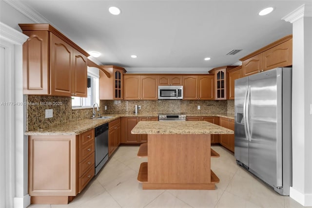 14481 SW 150th St, Miami, FL 33186 - kitchen with glass insert cabinets, visible vents, appliances with stainless steel finishes, light stone counters, and a sink