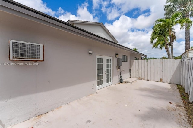 14481 SW 150th St, Miami, FL 33186 - view of patio / terrace featuring french doors and fence