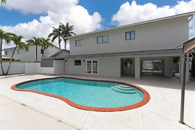 14481 SW 150th St, Miami, FL 33186 - view of pool featuring a fenced in pool, a patio, french doors, and fence
