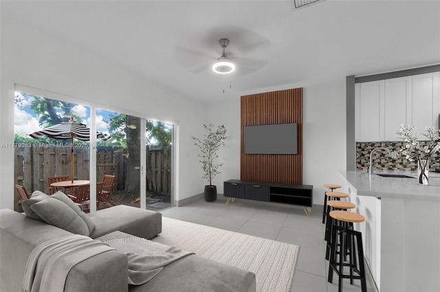 1720 NE 33rd Ave Unit 104-5, Homestead, FL 33033 - living area featuring a ceiling fan and light tile patterned floors