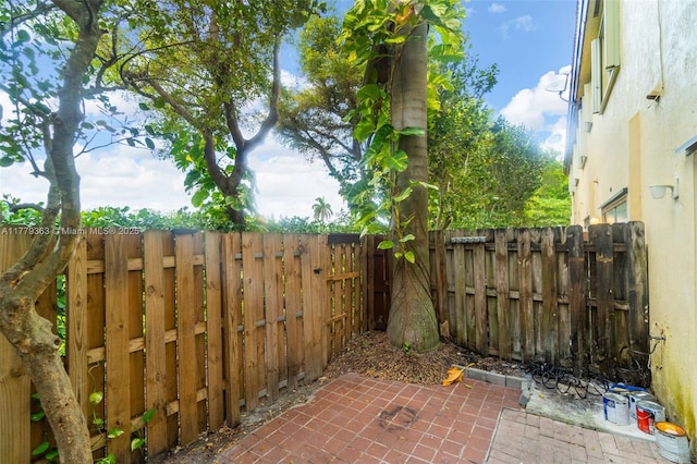 1720 NE 33rd Ave Unit 104-5, Homestead, FL 33033 - view of patio featuring fence