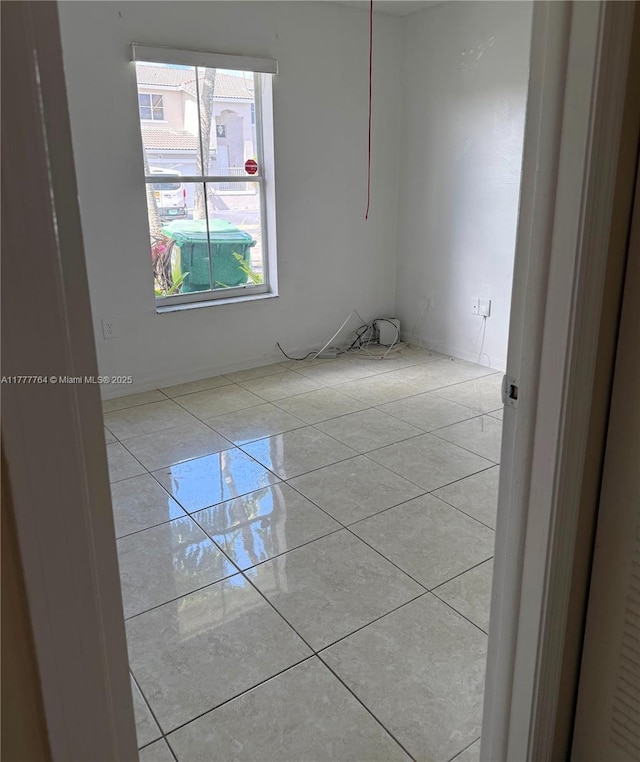 view of tiled empty room
