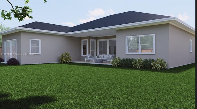 509 Glendale Ave, La Belle, FL 33935 - back of property featuring a yard, a patio, and stucco siding