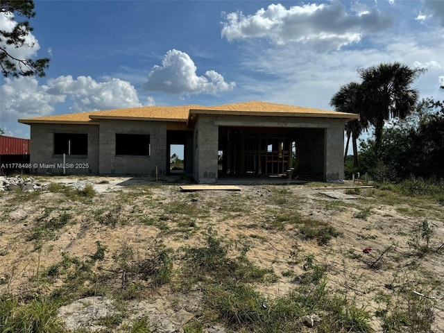 509 Glendale Ave, La Belle, FL 33935 - exterior space featuring concrete block siding and an attached garage