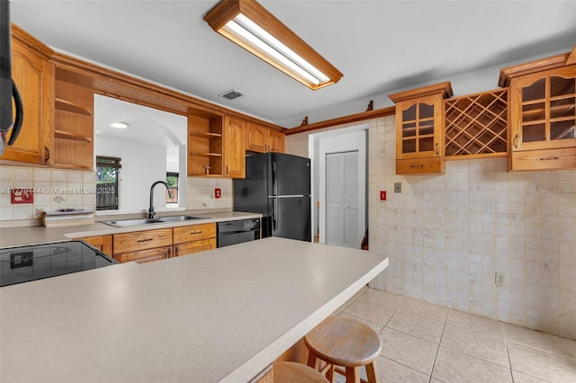 15026 SW 96th Ter, Miami, FL 33196 - kitchen featuring open shelves, visible vents, black appliances, light tile patterned flooring, and a sink