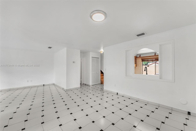 15026 SW 96th Ter, Miami, FL 33196 - spare room with a sink, baseboards, visible vents, and stairs