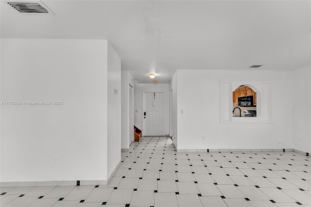 15026 SW 96th Ter, Miami, FL 33196 - entrance foyer featuring visible vents and baseboards