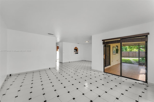 15026 SW 96th Ter, Miami, FL 33196 - unfurnished room with baseboards and visible vents