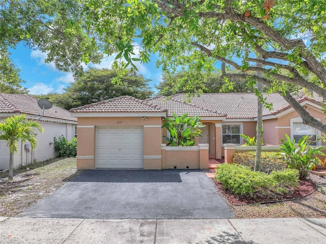 1617 Zenith Way, Weston, FL 33327 - view of front of house with stucco siding, a tile roof, asphalt driveway, a garage, and fence