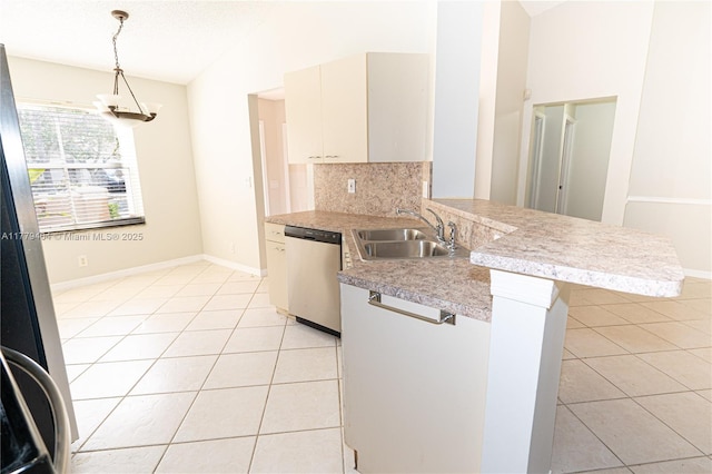 1617 Zenith Way, Weston, FL 33327 - kitchen featuring dishwasher, a sink, light tile patterned floors, a peninsula, and light countertops