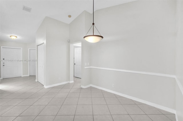 1617 Zenith Way, Weston, FL 33327 - unfurnished room featuring light tile patterned floors, baseboards, and lofted ceiling