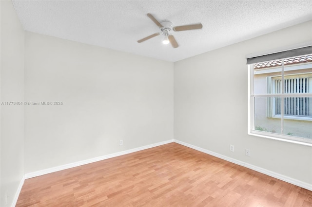 1617 Zenith Way, Weston, FL 33327 - empty room featuring ceiling fan, light wood finished floors, baseboards, and a textured ceiling