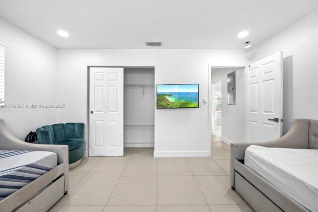 820 W Chaminade Dr, Hollywood, FL 33021 - bedroom with visible vents, baseboards, a closet, electric panel, and recessed lighting