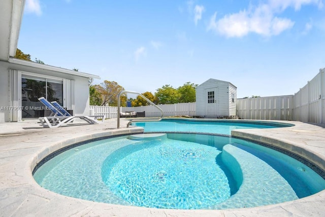820 W Chaminade Dr, Hollywood, FL 33021 - view of pool featuring a storage shed, a fenced backyard, a patio, an outbuilding, and a fenced in pool