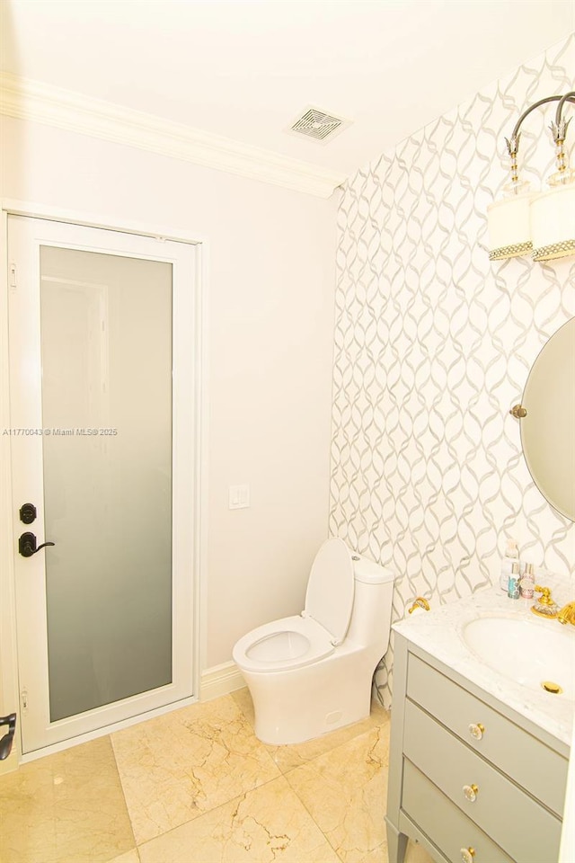 5025 Regency Isles Way, Cooper City, FL 33330 - bathroom with wallpapered walls, visible vents, toilet, vanity, and crown molding