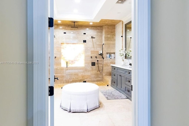 5025 Regency Isles Way, Cooper City, FL 33330 - bathroom with recessed lighting, tile patterned floors, visible vents, vanity, and tiled shower