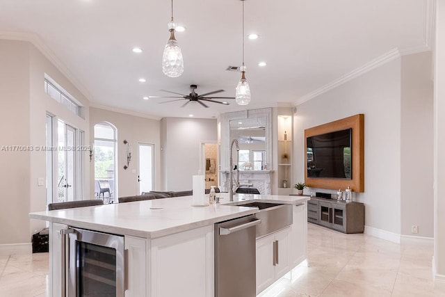 5025 Regency Isles Way, Cooper City, FL 33330 - kitchen with stainless steel dishwasher, a sink, beverage cooler, white cabinets, and ornamental molding