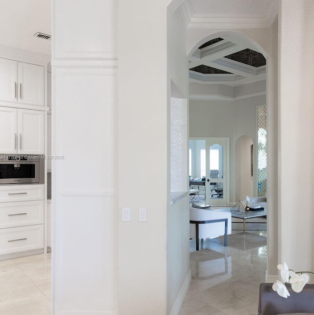 5025 Regency Isles Way, Cooper City, FL 33330 - hallway featuring beam ceiling, arched walkways, visible vents, coffered ceiling, and crown molding