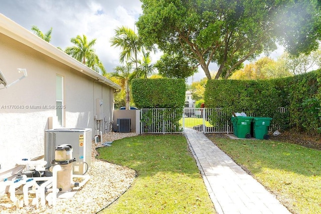 5025 Regency Isles Way, Cooper City, FL 33330 - view of yard featuring cooling unit and fence