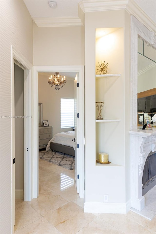 5025 Regency Isles Way, Cooper City, FL 33330 - hall featuring marble finish floor, crown molding, and a chandelier