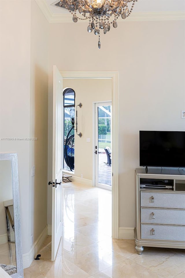 5025 Regency Isles Way, Cooper City, FL 33330 - corridor with a chandelier, crown molding, and baseboards