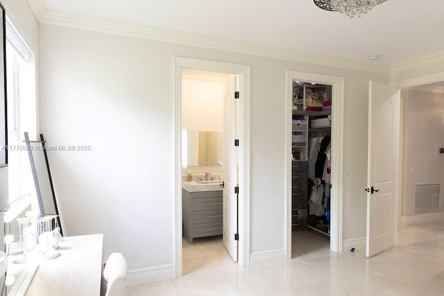 5025 Regency Isles Way, Cooper City, FL 33330 - bedroom with a walk in closet, ornamental molding, visible vents, and a closet