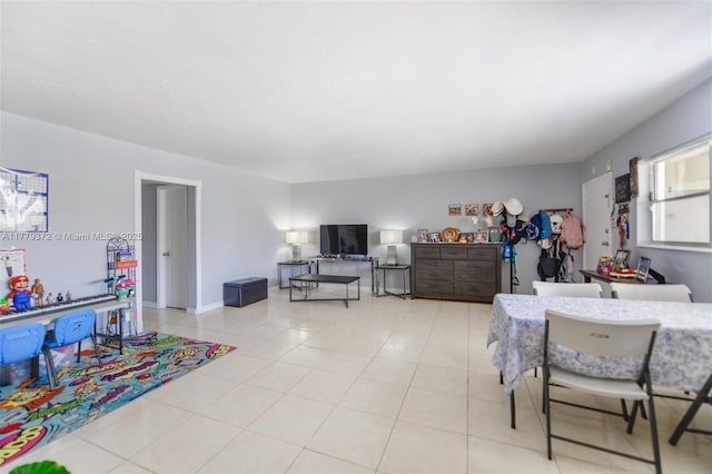 dining room featuring light tile patterned floors