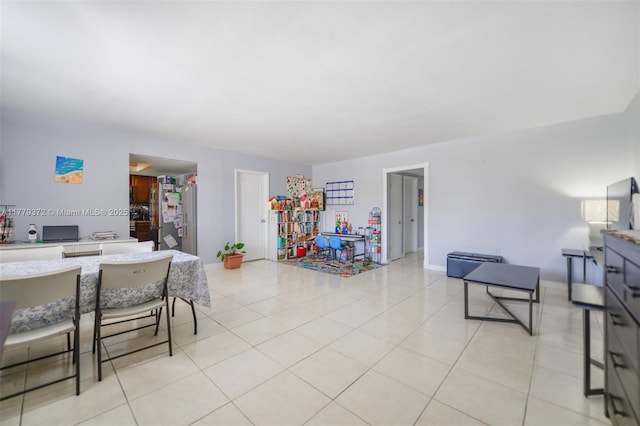 living area with light tile patterned floors