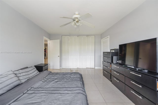 bedroom with light tile patterned flooring and ceiling fan