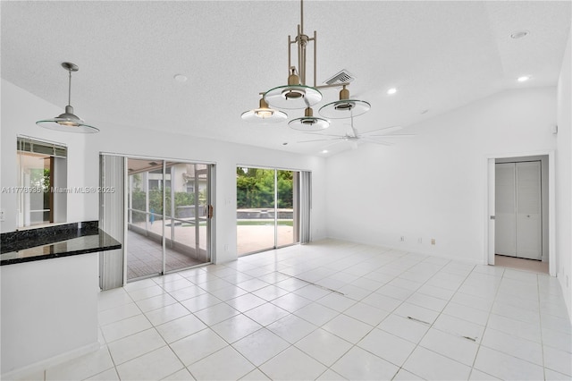 4622 NW 100th Ter, Coral Springs, FL 33076 - unfurnished room featuring vaulted ceiling, recessed lighting, light tile patterned floors, a chandelier, and a textured ceiling