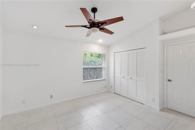 4622 NW 100th Ter, Coral Springs, FL 33076 - unfurnished bedroom with vaulted ceiling, recessed lighting, a closet, light tile patterned flooring, and a ceiling fan