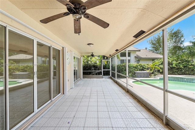 4622 NW 100th Ter, Coral Springs, FL 33076 - unfurnished sunroom featuring a ceiling fan