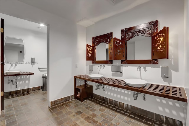 10 SW S River Dr Unit 610, Miami, FL 33130 - bathroom with a sink and baseboards
