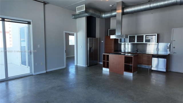 10 SW S River Dr Unit 610, Miami, FL 33130 - kitchen with stainless steel appliances, concrete floors, modern cabinets, a towering ceiling, and a kitchen island