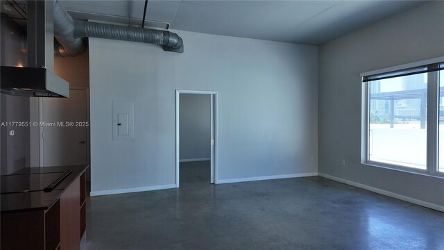 10 SW S River Dr Unit 610, Miami, FL 33130 - spare room with concrete floors, baseboards, and electric panel