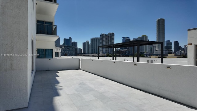 10 SW S River Dr Unit 610, Miami, FL 33130 - view of patio / terrace featuring a skyline view and a balcony